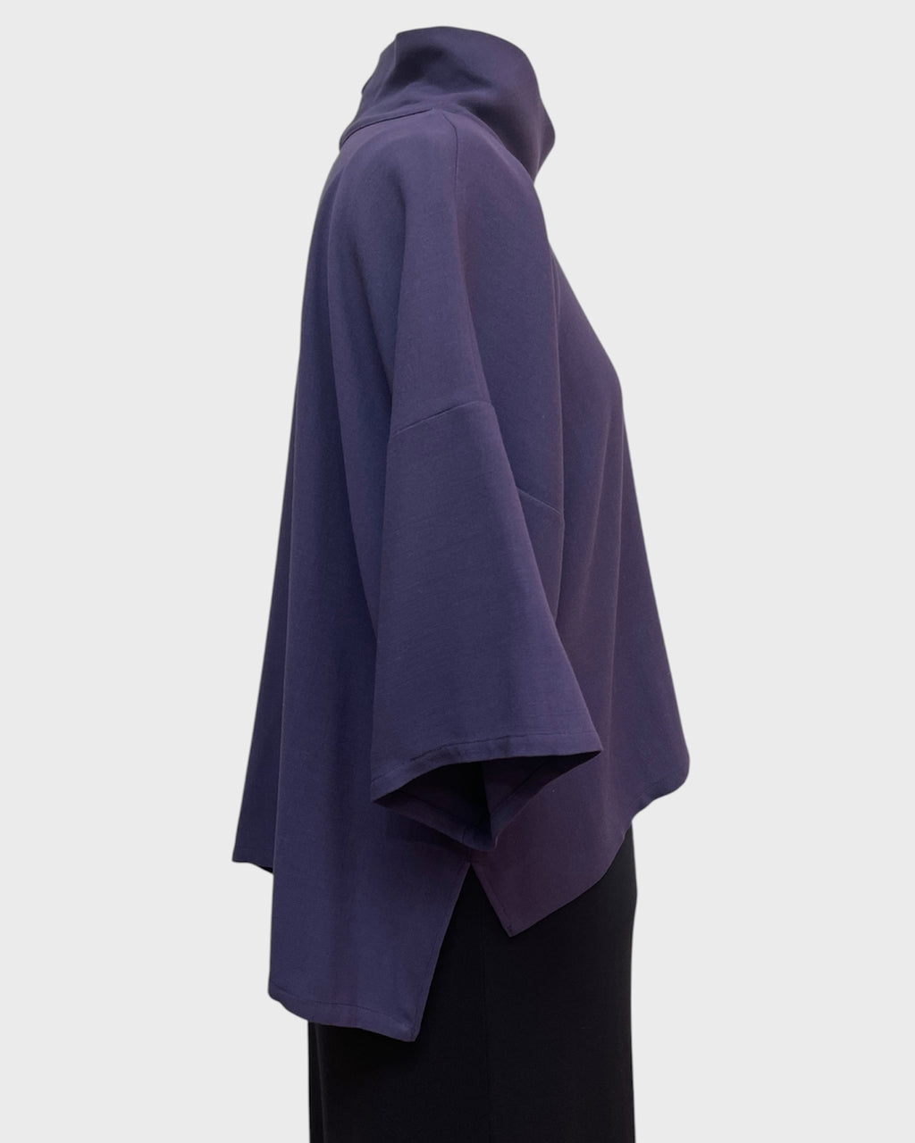 Right side view of relaxed fit eggplant cowl neck tunic in wool suiting
