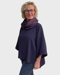 Side view of relaxed fit eggplant cowl neck tunic in wool suiting