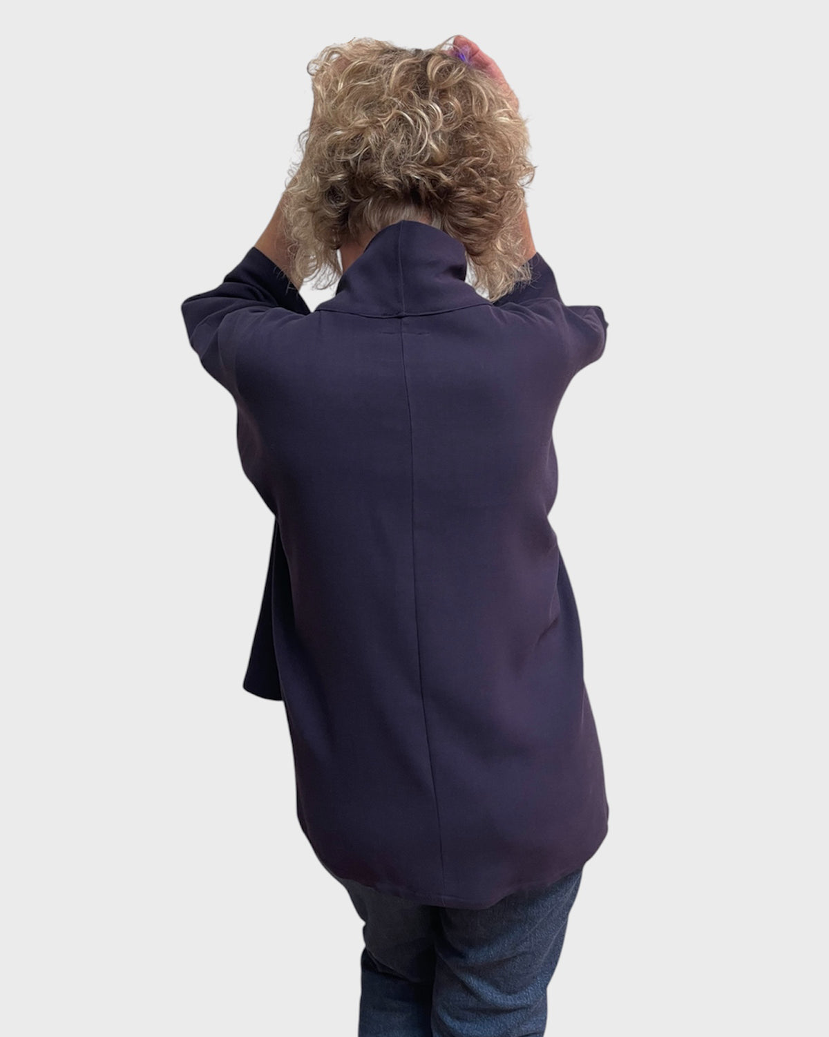 Back again of slouchy eggplant wool tunic, one size women’s tunic with ¾ sleeves
