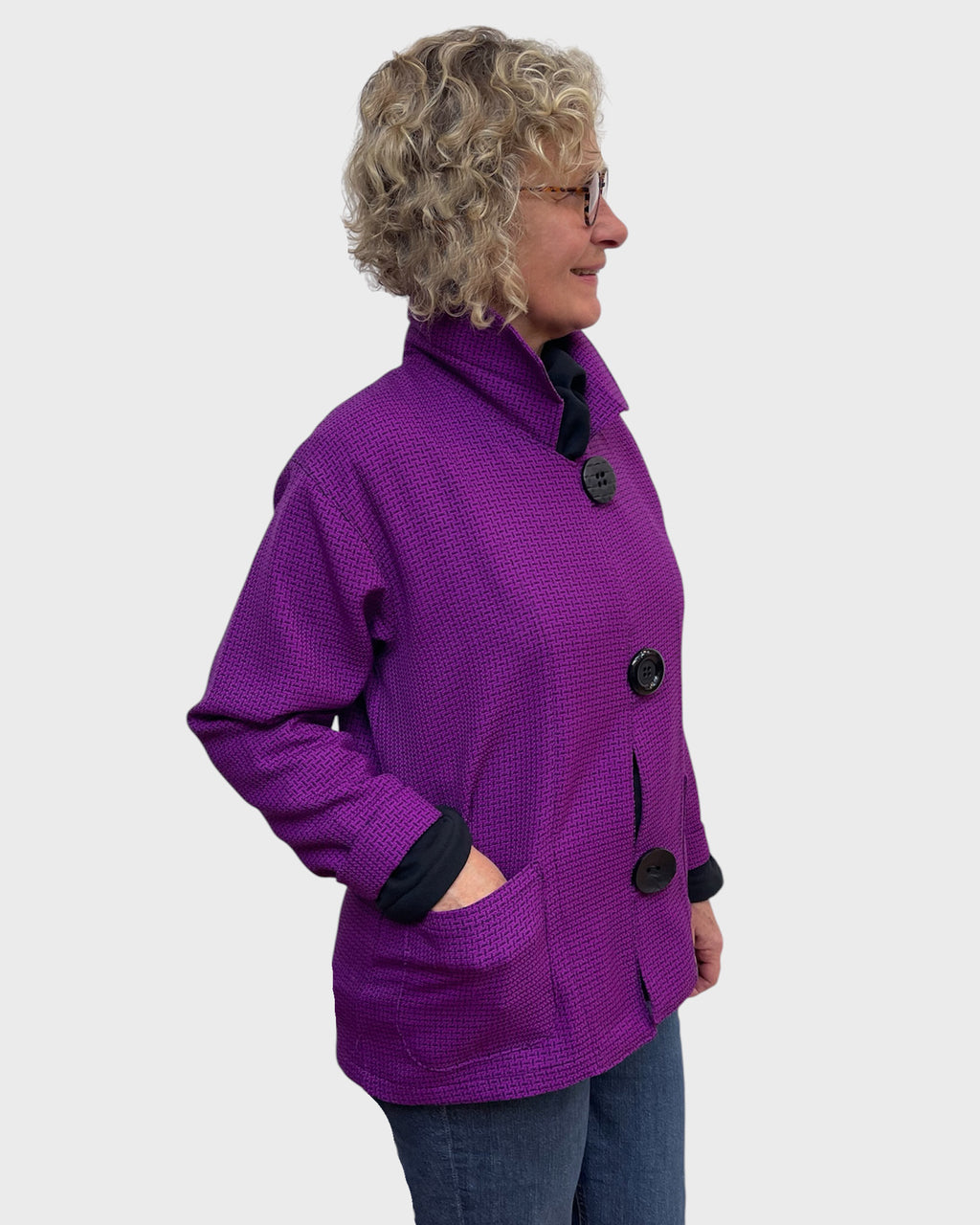 Side view of fuchsia black wool jacket with patch pocket and stand up collar