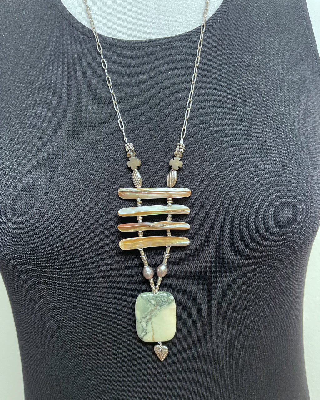 Bohemian necklace: silver chain, four horizontal shell bars, freshwater pearls, green marbled stone pendant, crystal