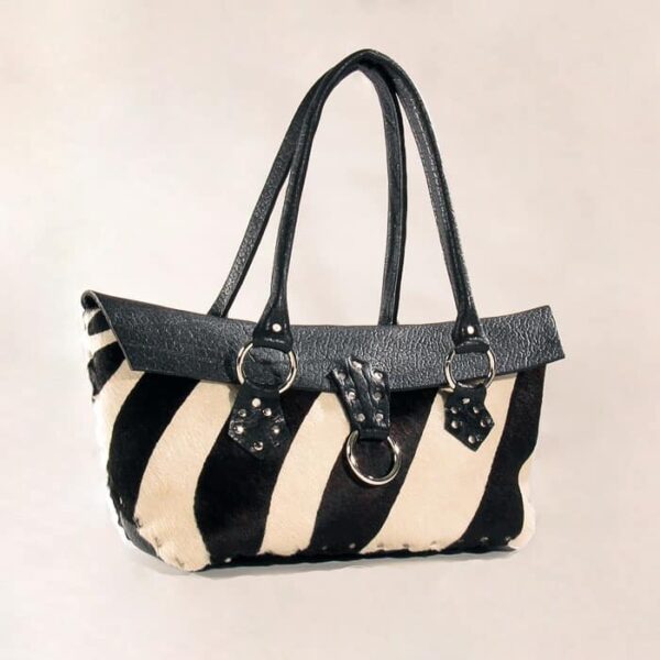 Black white hair on silver riveted purse