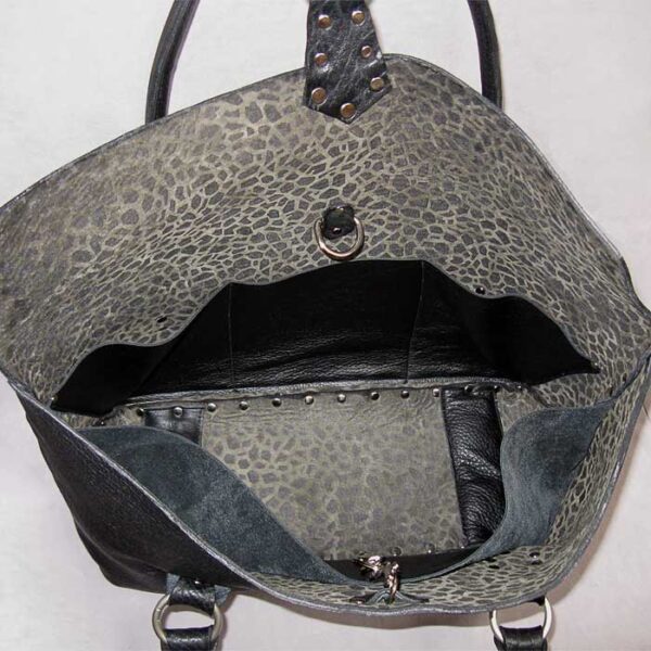 Black leather lined silver riveted purse