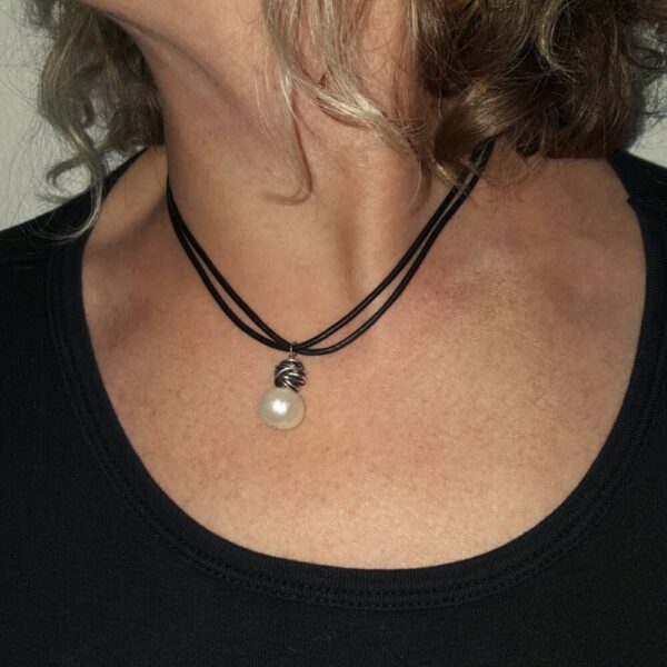 Hand wrapped sterling knot with pearl necklace