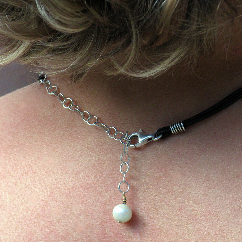 Hand wrapped sterling knot with pearl necklace